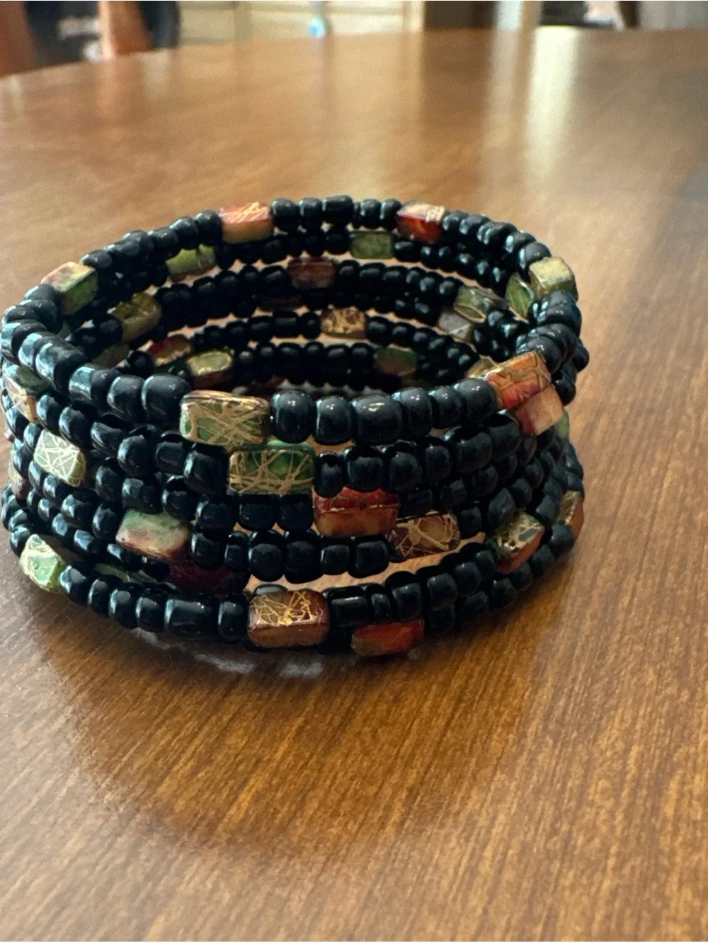 Handcrafted Black Beaded Coil Bracelet with Multicolor Accent Beads